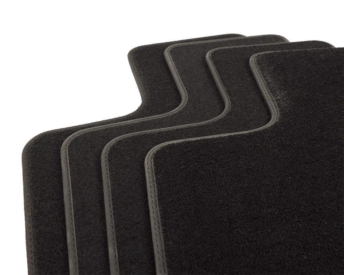 Tapis de voiture sur mesure — détail de la moquette et de la bordure